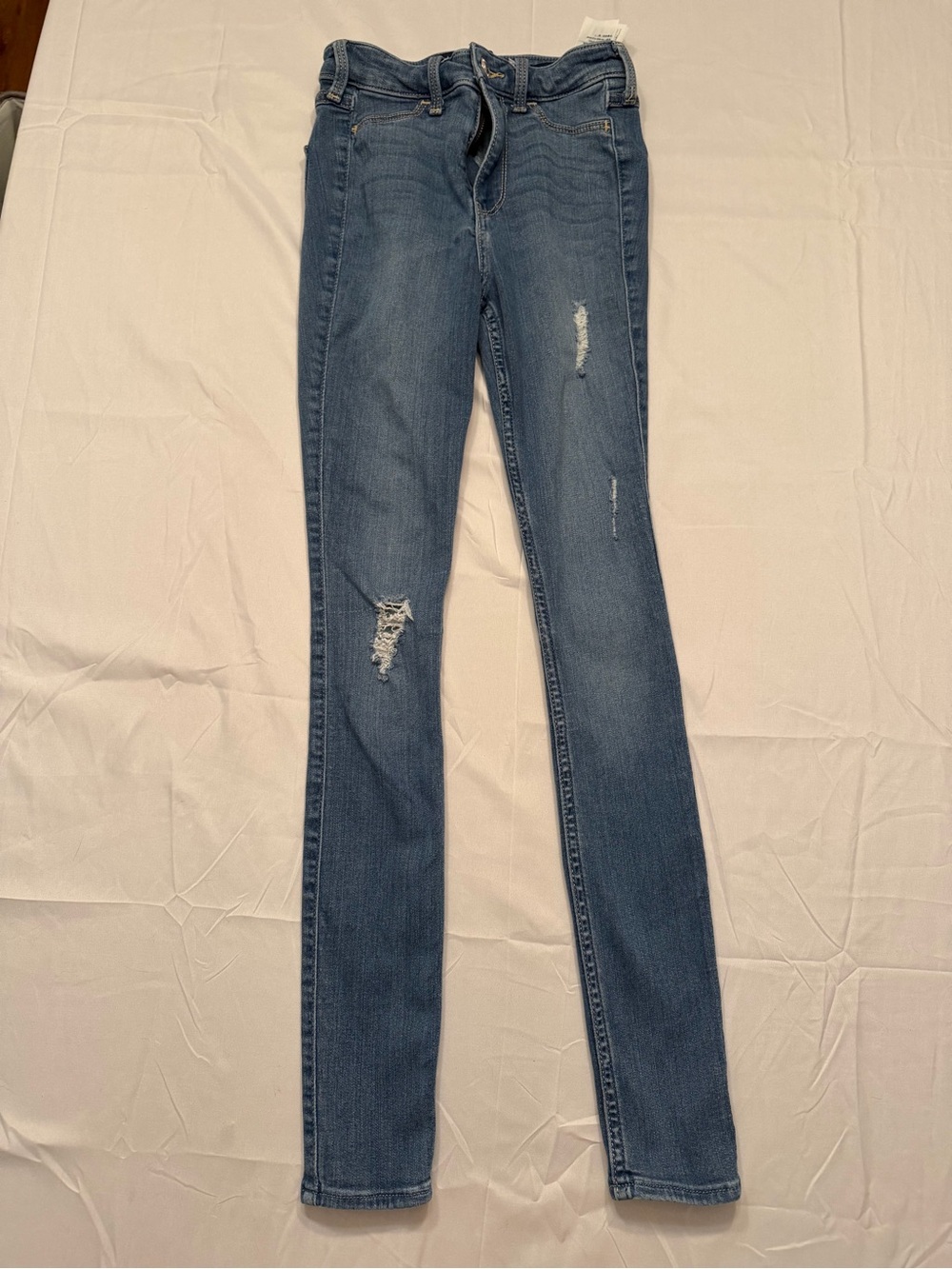 Hollister High Rise Jeans in Medium Blue Wash with Distressed Knees